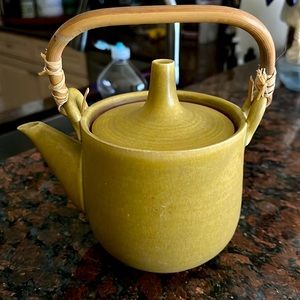Asian style mustard colored ceramic tea pot wooden handle with raffia wrapper